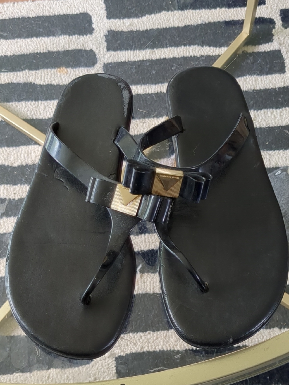 Michael Kors Black Bow Thong Sandals with Gold Accent